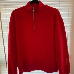 Red quarter zip sweater